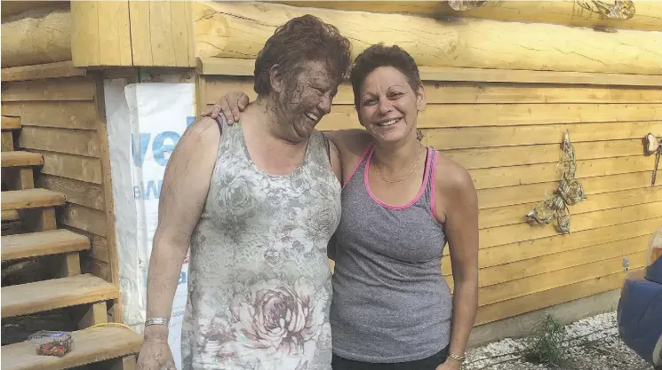  ?? SUPPLIED ?? Joanne Barnaby, left, was picking mushrooms with her friend Tammy Caudron, right, when she encountere­d a hostile wolf. She escaped it during the night by siccing a bear on it.
