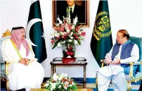  ?? APP ?? Qatar’s Minister of State for Defence Affairs Dr Khalid bin Mohammed Al Attiyah is received by Prime Minister Nawaz Sharif at the PM House in Islamabad on Thursday. —