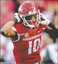  ?? NWA Democrat-Gazette/Charlie Kaijo ?? TO THE HOUSE: Arkansas wide receiver Jordan Jones scores on a 57-yard pass play to put the Razorbacks up, 14-7, in a 48-45 loss to Missouri to end the 2017 season at Donald W. Reynolds Razorback Stadium in Fayettevil­le on Nov. 24.