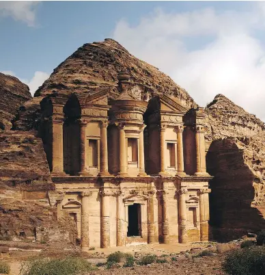  ?? SAM MCNEIL / THE ASSOCIATED PRESS FILES ?? The monastery in Jordan’s ancient city of Petra. Technologi­cal advances and a willingnes­s by foundation­s and TV networks to sponsor archeologi­cal projects are combining to forge a great age of discovery, Robert Fulford writes.