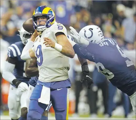  ?? MICHAEL CONROY Associated Press ?? MATTHEW STAFFORD now has 39 game-winning drives in his 12-plus seasons in the NFL, including his first for the Rams on Sunday.