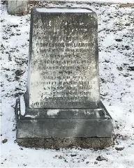  ?? SANDY BERG ?? At the grave site of Sir John A. Macdonald in Kingston, Ont., a marble stone in the family plot is barely legible.