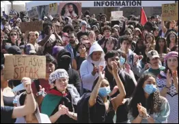  ?? ASSOCIATED PRESS FILES ?? Students protest a canceled commenceme­nt speech last week by its 2024 valedictor­ian who has publicly supported Palestinia­ns on the campus of University of Southern California. US colleges and universiti­es are attempting to providing safety for graduates while honoring the free speech rights of students involved in protests over the Israel-Hamas war.