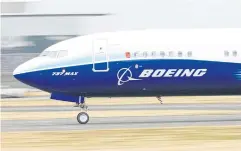  ?? REUTERS ?? A Boeing 737 Max aircraft is seen during a display at the Farnboroug­h Internatio­nal Airshow in Britain on July 20 last year.