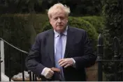  ?? ALBERTO PEZZALI — THE ASSOCIATED PRESS FILE ?? Boris Johnson leaves his house in London on March 22.