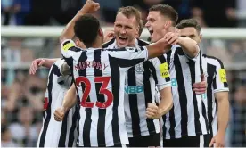  ?? Action Images/Reuters ?? Newcastle players celebrate reaching the Champions League. Photograph: Lee Smith/