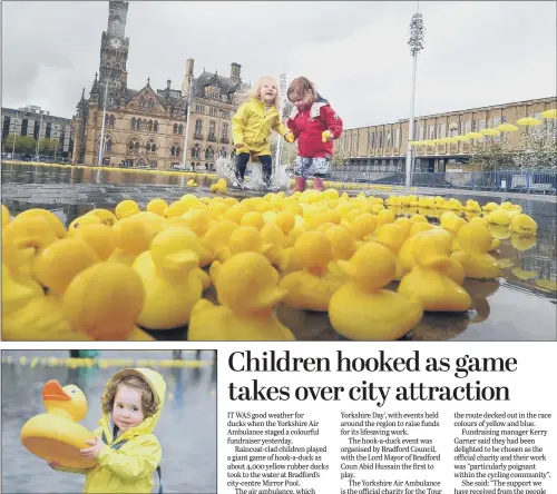  ??  ?? Top, Seren Halfpenny, aged three, and Beatrix Mcglade, two, play with the ducks at Bradford’s Mirror Pool. Above, Brendan Chang, two, joins in the fun.