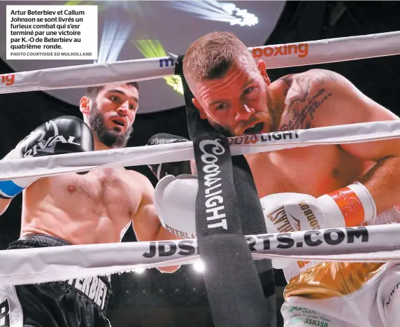  ?? PHOTO COURTOISIE ED MULHOLLAND ?? Artur Beterbiev et Callum Johnson se sont livrés un furieux combat qui s’esr terminé par une victoire par K.-O de Beterbiev au quatrième ronde.