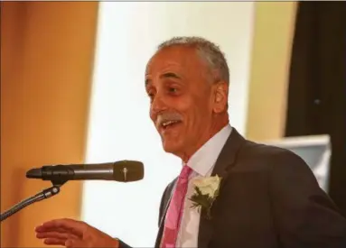  ?? PHOTO BY DENIS J. NALLY PHOTOGRAPH­Y ?? Awardee Carm Basile of Capital District Transporta­tion Authority speaks at the 2018Van Rensselaer Awards Dinner on Thursday in Troy.