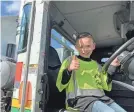  ?? PROVIDED BY MAKE-A-WISH FOUNDATION ?? Carter Gomes, 7, gives a thumbs up from a Turlock Scavenger garbage truck as the Make-A-Wish Foundation granted him his wish of becoming a member of the collection team for a day in Turlock, Calif.