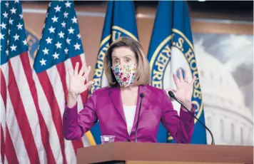  ?? J. SCOTT APPLEWHITE/AP ?? House Speaker Nancy Pelosi said Thursday of President Trump’s actions regarding the Capitol riot: “A threshold was crossed of such magnitude” that he should not be allowed to make any decisions.
