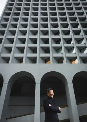  ??  ?? URBAN RETREAT Peter Woo outside the Murray, Hong Kong’s newest luxury hotel