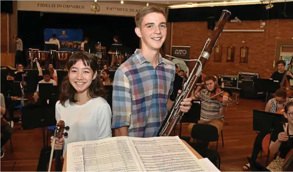  ?? Photo: Bev Lacey ?? MUSICIANS: Performing with the Australian Youth Orchestra’s Young Symphonist­s program are Sola Hughes (left) and Jamie Dodd.