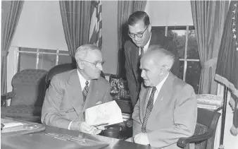 ?? (Harry S. Truman Presidenti­al Library and Museum) ?? THEN-PRIME minister David Ben-Gurion speaks with then-US president Harry S. Truman during a gift ceremony in the Oval Office, as then-ambassador to the US Abba Eban stands between them, in 1951.