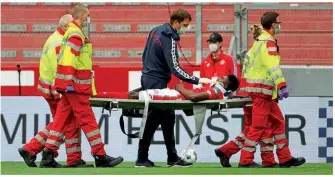  ??  ?? Concussion…Awoniyi was knocked out in his final appearance for Mainz last season