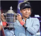  ?? ROBERT DEUTSCH/USA TODAY SPORTS ?? Naomi Osaka defeated Serena Williams to win the 2018 US Open trophy.