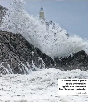  ?? Dimitris Legakis ?? &gt; Waves crash against rocks by Mumbles lighthouse in Bracelet Bay, Swansea, yesterday