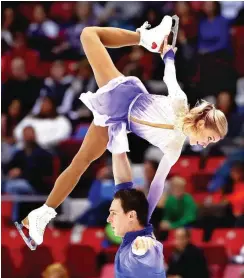  ?? Foto: AFP/Getty Images/Tim Bradbury ?? Sieg beim Skate America: Sawtschenk­o/Massot