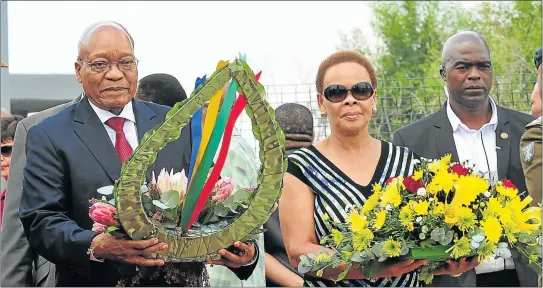  ?? Picture: GCIS ?? SOMBRE MOMENT: President Jacob Zuma lays a wreath at the late Thembesile Chris Hani’s tombstone with Hani’s widow, Dimpho Hani, to honour and celebrate the life and legacy of one of the country’s most respected struggle stalwarts at Thomas Nkobi...