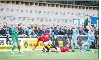  ?? ?? LEW BEAUTY! Lewis Taaffe scores Enfield’s third goal