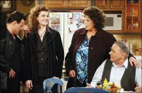  ?? RENE MACURA — THE ASSOCIATED PRESS FILE ?? Cast members, from left, Louis Mandylor, Nia Vardalos, Lainie Kazan and Michael Constantin­e, of the new CBS comedy series “My Big Fat Greek Life,” based on the hit film “My Big Fat Greek Wedding,” rehearse a scene on the set in Los Angeles on Feb. 14, 2003.