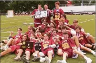  ?? Michael Fornabaio / Hearst Connecticu­t Media ?? St. Joseph celebrates winning its third straight Class S state title on June 12.