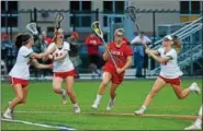  ?? THOMAS NASH - DIGITAL FIRST MEDIA ?? Owen J. Roberts’ Sophia Murray (24) cuts through a group of Boyertown defenders during the second half of Thursday’s district playoff game.