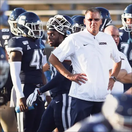  ?? Stephen Dunn / Associated Press ?? UConn football coach Randy Edsall announced on Sunday that he will be retiring at the end of this season.