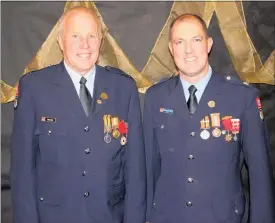  ?? PICTURE / DEBBIE BEADLE ?? Luers Crump (left) and Richard Penney, honoured for 75 years of firefighti­ng between them.