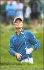  ?? Gregory Shamus / Getty Images ?? Justin Rose reacts to his shot from a bunker on the 17th hole during the third round of the BMW Championsh­ip Saturday.