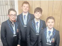  ??  ?? Pictured ( from left) are Joshua Howard-Hughes, Alfie Mather, George Winckles and Ben Clayton who swam superbly representi­ng Wade Deacon High School in the North West Area ESSA School Championsh­ips in Liverpool.