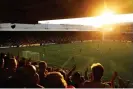  ?? ?? 5 August 2022The sun sets over Selhurst Park during the opening game of the season between Crystal Palace and Arsenal. Arsenal won 2-0. Photograph: Julian Finney/ Getty Images