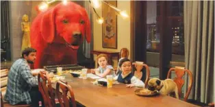  ?? PARAMOUNT PICTURES VIA AP ?? From left, Jack Whitehall, Darby Camp and Izaac Wang appear in a scene from “Clifford the Big Red Dog.”