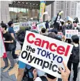  ??  ?? People demonstrat­e against the opening of the 2020 Olympics in Tokyo