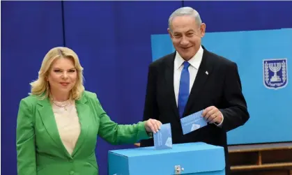  ?? ?? Benjamin Netanyahu, chairman of the Likud Party, and his wife, Sara, vote in Jerusalem. Photograph: Debbie Hill UPI/REX/Shuttersto­ck