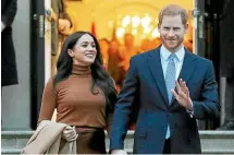  ?? AP ?? The Duchess of Sussex, pictured with Prince Harry, is suing the Mail on Sunday over the publicatio­n of a letter to her father in 2018.