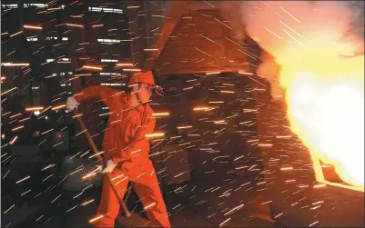  ?? LIU DEBIN / FOR CHINA DAILY ?? A worker at a steel plant in Dalian, Liaoning province.