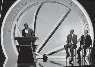  ?? Maddie Meyer / Tribune News Service ?? Former Miami Heat star Chris Bosh, presented by Ray Allen and Pat Riley at right, speaks during his induction to the Naismith Memorial Basketball Hall of Fame on Saturday night.