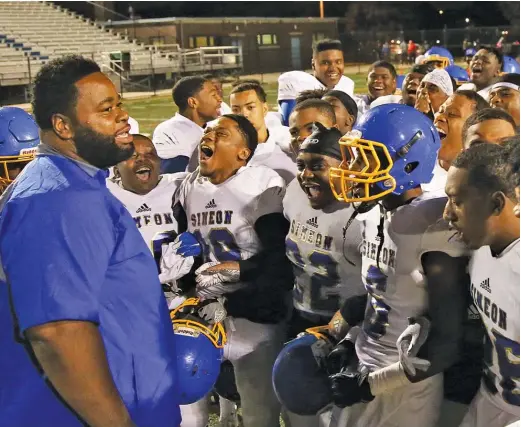  ?? ALLEN CUNNINGHAM/FOR THE SUN-TIMES ?? Simeon football coach Dante Culbreath says the teachers strike might cost some players a chance at a college scholarshi­p.