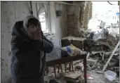  ?? ROMAN HRYTSYNA — THE ASSOCIATED PRESS ?? Halina Panasian, 69, reacts inside her destroyed house in Hlevakha, Kyiv region, Ukraine, on Thursday after a Russian rocket attack.