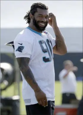  ?? CHUCK BURTON— ASSOCIATED PRESS ?? In this July 28 file photo, the Panthers’ Julius Peppers smiles during a practice at the team’s training camp in Spartanbur­g, S.C.