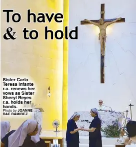  ?? Photo by JOANNE RAE RAMIREZ ?? Sister Carla Teresa Infante r.a. renews her vows as Sister Sheryl Reyes r.a. holds her hands.