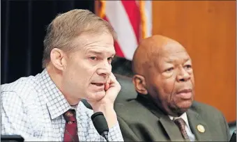  ?? [J. SCOTT APPLEWHITE/THE ASSOCIATED PRESS] ?? Rep. Jim Jordan, of Ohio, the House Oversight and Reform Committee ranking Republican, left, and Chairman Elijah Cummings, D-Md., right, listen during a committee hearing Tuesday on Capitol Hill in Washington.