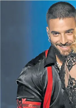  ??  ?? Maluma y Madonna, juntos en el último disco de la diva