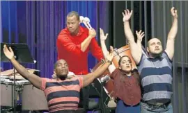  ??  ?? DANCERS strike a pose in reaction to percussion­ist Sidney Hopson’s stylings during the production Saturday evening at the Valley Performing Arts Center.