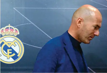  ?? FOTO AFP ?? Tras la salida de Zinedine Zidane del banco del Real Madrid, Florentino Pérez ya busca opciones para su reemplazo. Mauricio Pochettino y José María Gutiérrez, los principale­s candidatos.