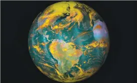  ??  ?? IN SPACE: NOAA/NASA image shows planet Earth. Carbon emissions from burning fossil fuels have been nearly flat for three years in a rowa ‘great help’ but not enough to stave off dangerous global warming, a report said on November 14, 2016. — AFP