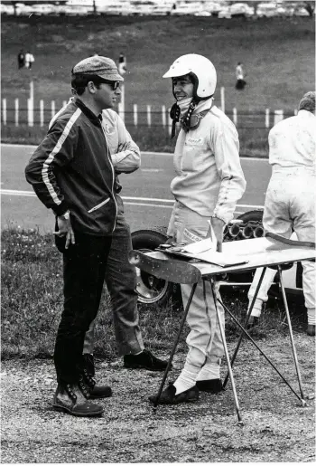  ??  ?? Left: Chatting with a promising David Oxton at Pukekohe in the mid ’60s, with Graeme Lawrence attending to his Brabham in the background (photo: Jack Inwood)