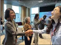  ?? (Bloomberg (WPNS)/Jane Lanhee Lee) ?? Michelle Meng-Hsiung Kiang (left), co-founder of Impact Science Ventures, engages in an introducti­on game at the U.S. National Science Foundation’s first technology startup workshop overseas in Taipei.