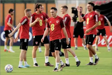  ?? ?? Wales’ defender Connor Roberts (C) takes part in a training session at the Al Sadd Sports Club in Doha on Thursday, ahead of FIFA World Cup Qatar 2022.